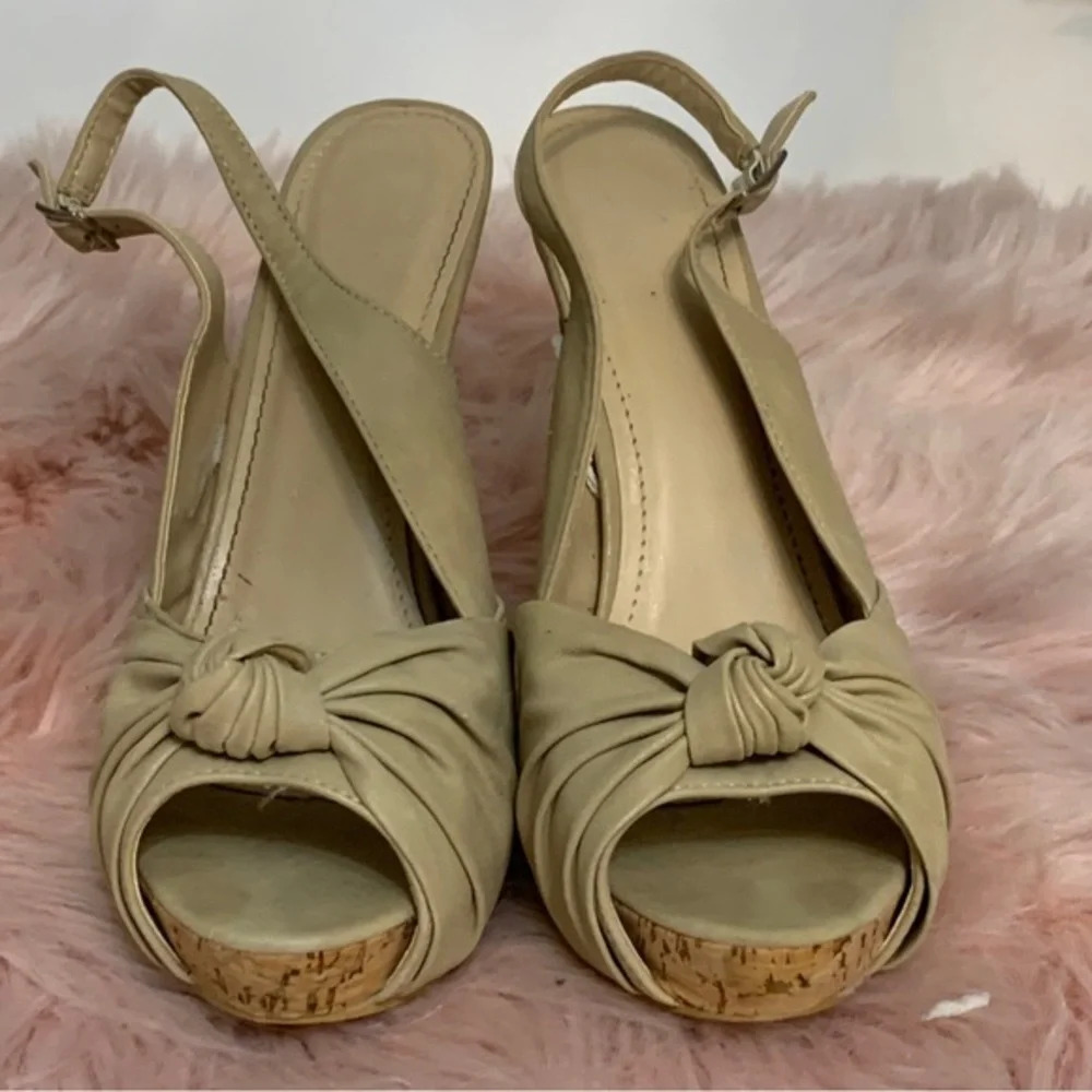 A.CO WOMANS BEIGE SIZE 10 with cork on base and heel look amazing